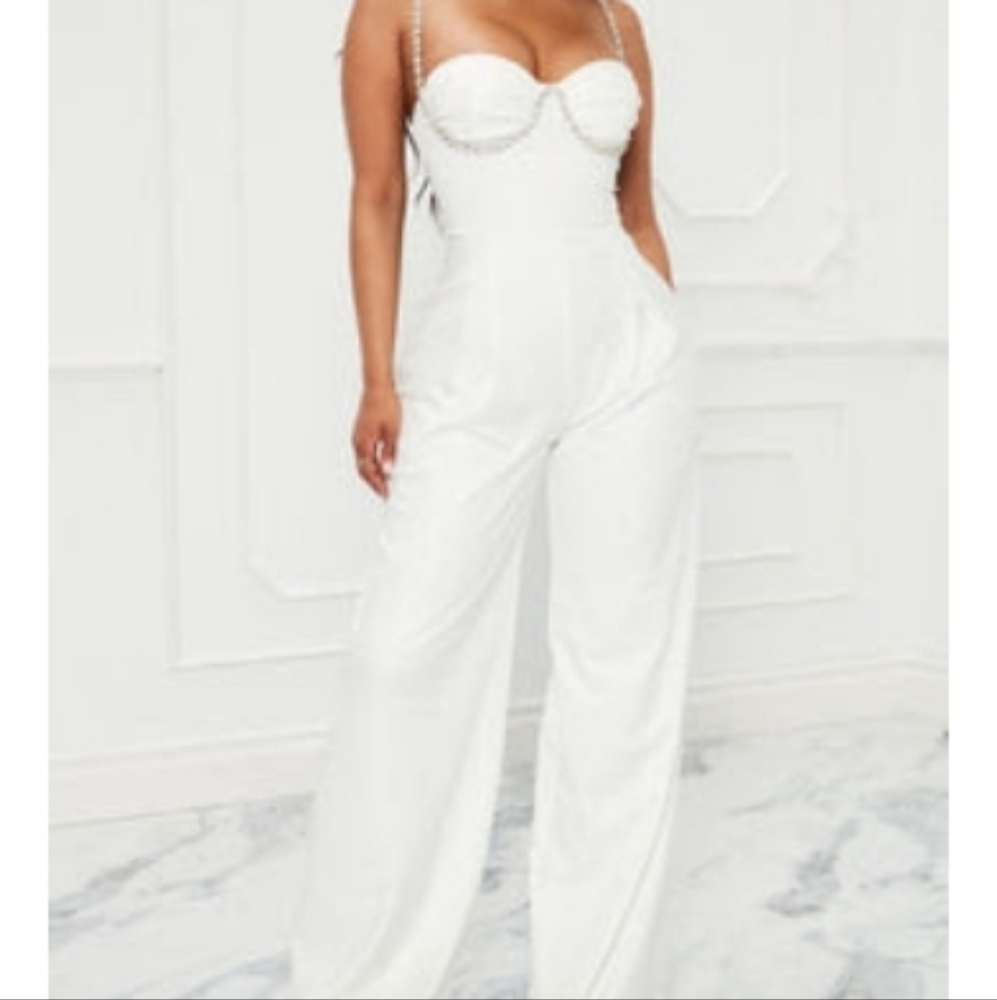 White jumpsuit with diamond straps